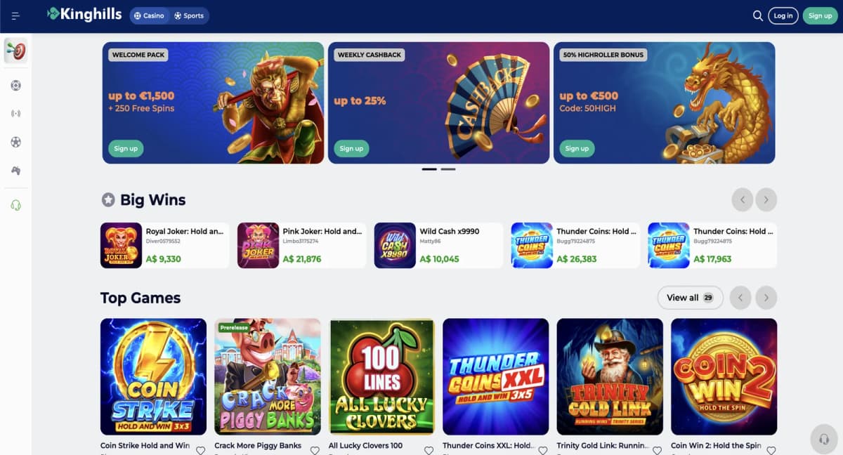 KingHills Casino UK licensed homepage with Big Wins showcase, Top Games carousel featuring Piggy Bank and Lucky Clovers slots, clean white interface